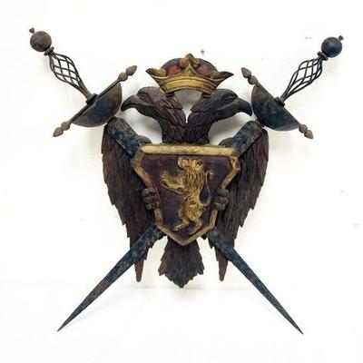 1144	WOOD CARVED ARMORIAL COAT OF ARMS WITH METAL CROSSED SWORDS, APPROXIMATELY
