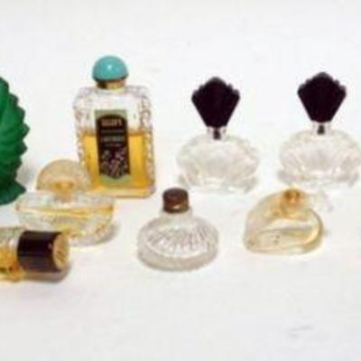 1039	GROUP OF ASSORTED MINIATURE PERFUMES
