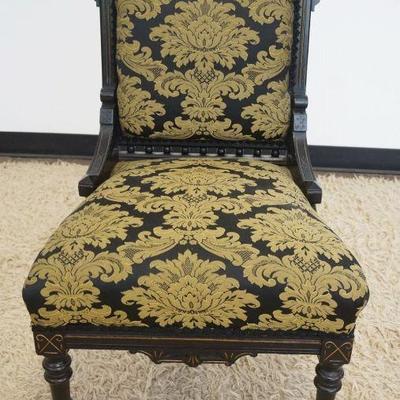 1207	VICTORIAN UPHOLSTERED PARLOR CHAIR IN EBONIZED FINISH
