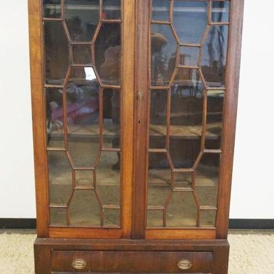 1219	EMPIRE MAHOGANY 2 DOOR OVER 1 DRAWER BOOKCASE CABINET WITH INDIVIDUAL PANE GLASS DOORS AND 3 ADJUSTABLE SHELVES AND CARVED PAW FEET,...