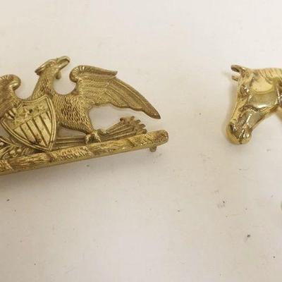 1159	BRASS METAL CRAFTERS CAST EAGLE WITH SHEILD & HORSE HOOK, APPROXIMATELY 4 IN X 8 IN
