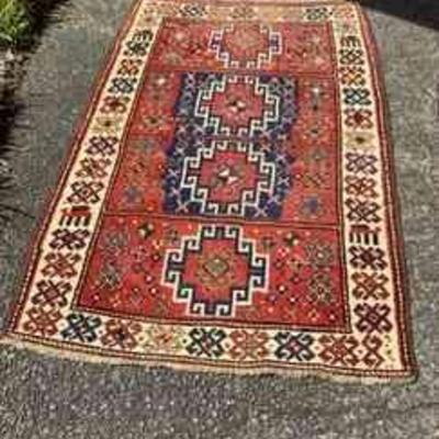 TOSH356 Handwoven Rug #8	This rug is approximately 73" long x 46" wide. Possibly antique and from Caucasus. One corner has been...