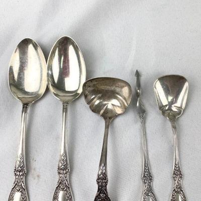 FLRO336 Sterling Serving Pieces No: 2	Lot includes: Ladle, Relish Spoon, Large Serving Spoons and a Butter Pick.

