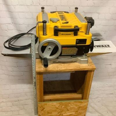 TOSH700 Dewalt 13” Planer	Dewalt brand 13" planar mounted on wooden rolling cart. Tested and works, cart measures approximately...