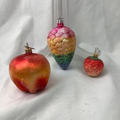 DILA321 Vintage 1990’s Radko Fruit Inspired Ornaments	Lot includes:  Sugared Strawberry, an Apple and a colorful pine one.

