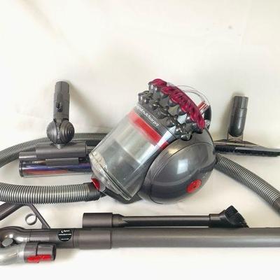 TOSH804 Dyson Rolling Vaccuum	Dyson Big Ball rolling vacuum. Tested and works, includes assortment of attachments.
