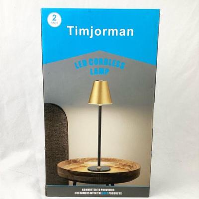 DILA347 Timjorman Khaki Table Lamps	Still in original packaging these lamps are 13.97" tall and 3.46" wide.   They are made of...