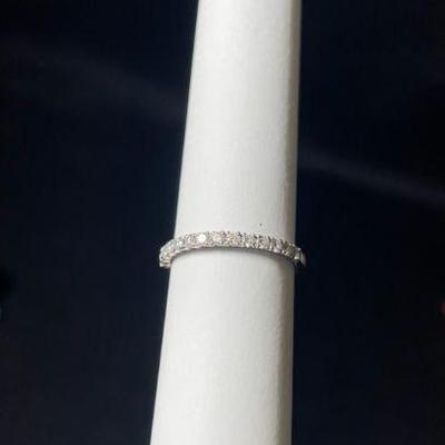 KIHE733 Estate Platinum & Diamond Half Eternity Ring	Platinum band with fourteen round brilliant cut diamonds. Purchased from very...