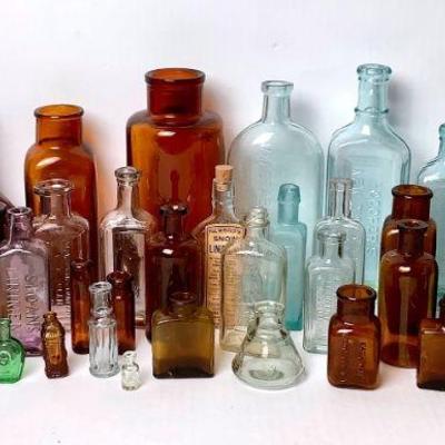 DILA209 Antique/Vintage Assortment Glass Bottles	A mixture of Alixer, Chemical, Perfume, Pharmacy & Pill bottles, as well as others....
