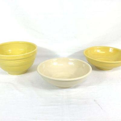 DILA704 Fiesta-ware Mixing & Serving Bowls	Set of three yellow fiesta-ware mixing and serving bowls. Smaller serving bowls measure...