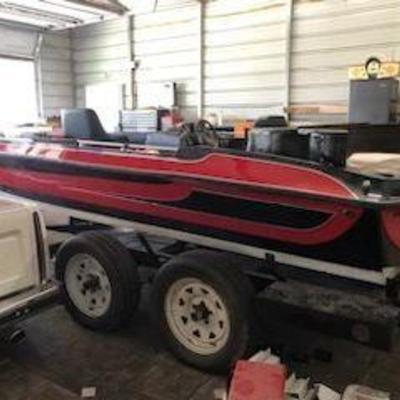Refurbished outboard motorboat with Mercury Black Max motor and Hustler boat trailer. Comes with new seats to be installed. 