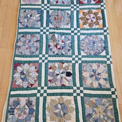 Hand Stiched Flower Quilt is 63 X 80in
