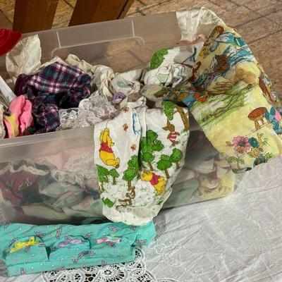 Tote Of Doll Clothes And Materials
