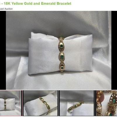Lot # : 4 - 18K Yellow Gold and Emerald Bracelet
exquisite bracelet featuring nine links, each adorned with meticulously bevel-set...