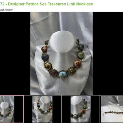 Lot # : 172 - Designer Patrice Sea Treasures Link Necklace
Patrice Sea Treasures Necklace: Handcrafted Opulence! Delve into luxury with...