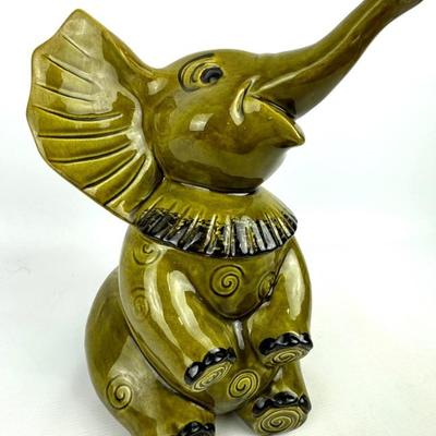 #257 • Doranne of California Elephant Cookie Jar in Green
https://www.lux.bid