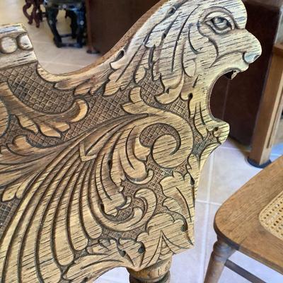 Lion head detail on chairs