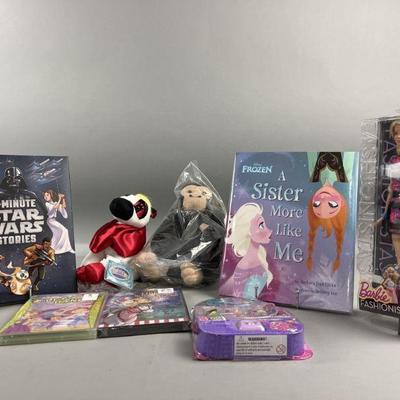Lot 129 | Disney & Star Wars Books, Barbie DVDs & More

