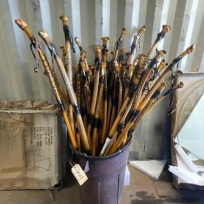 #4512 • Collection of Wooden Carved Walking Sticks
