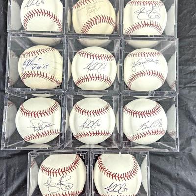 Lot of Eleven Signed Baseballs in Display Cases