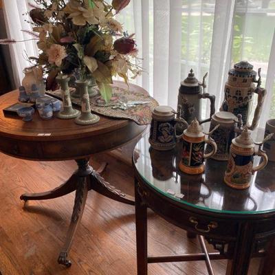 Two round antique mahogany occasional tables by Lane and Collection of German Beer Steins