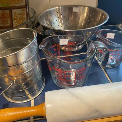 Kitchen essentials, measuring cups, rolling pins