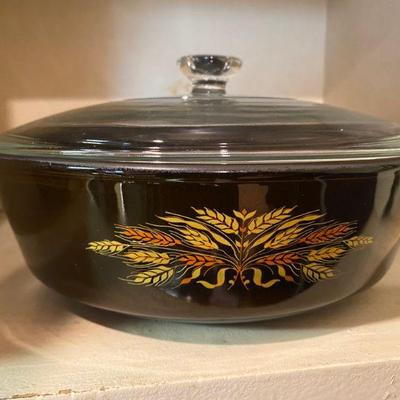 Pyrex wheat pattern casserole dish, amber glass