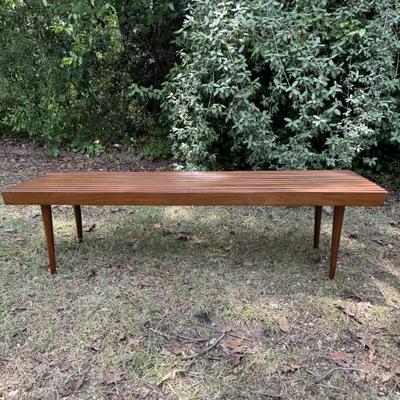 $395 Mid-century slatted bench/coffee table. Made in Yugoslavia. Appears to be walnut. Measures 60” long, 18” wide and 16” tall. 