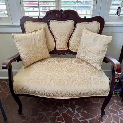$175-2 seater settee upholstered in yellow 38"H 37"L 23"depth