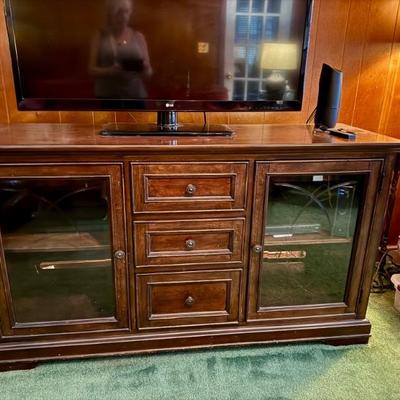 $155- Console cabinet, beveled glass on 2 doors, 3 drawers 34"H 60"L 20"depth