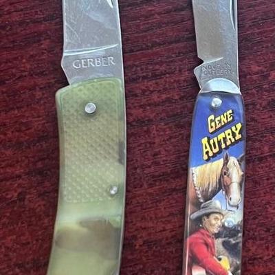 (2) Pocket Knives - Gene Autry Novelty & Gerber With Plastic Handle 