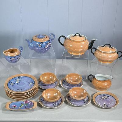 (21PC) LUSTERWARE TEA SET | Including: 4 teacups, 5 saucers, 6 dessert plates, 2 teapots, 2 creamers, 1 sugar bowl and small dish. - l. 9...