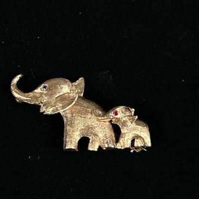 SAPPHIRE & 14K GOLD ELEPHANT PIN | Designed as a 14K gold elephant-form pin/brooch set with blue & pink sapphires, marked on back...