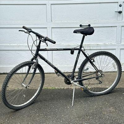 TREK MOUNTAIN TRACK 800 | 21-speed TREK Mountain Track 800 bike 19in frame with shimano brakes and shimano Altus chain tensioner.

