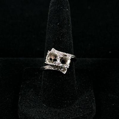 14K WHITE GOLD RING FINDING | Having 2 large open settings with graduating melee diamonds on the side, marked "14K"; 4.4g. Ring...