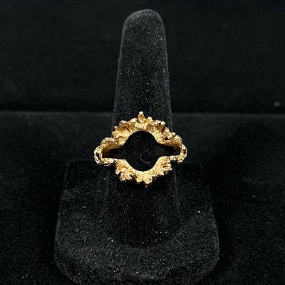 14K GOLD RING SHEATH | Designed as a (tested as) 14K gold ring sheath with open design to slide smaller ring within; 5.9g. Ring size: 6...