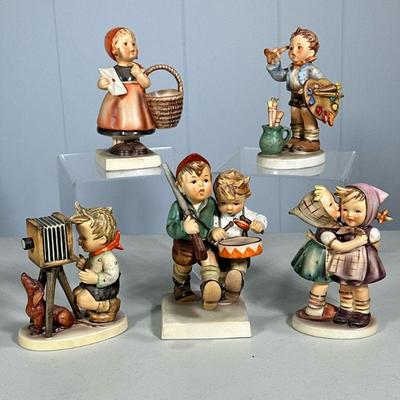 (5PC) MIXED HUMMEL FIGURINES | Including: Volunteers Hum 50/I, The Photographer Hum 178, Meditation Hum 13/0, Telling Her Secret Hum...