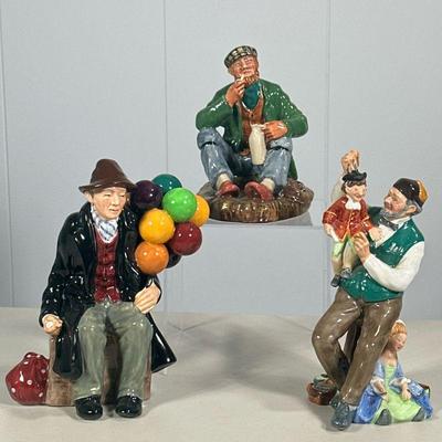 (3PC) ROYAL DOULTON MALE FIGURINES | Including: The Balloon Man, The Puppet Maker, and The Wayfarer. - l. 6 x w. 4 x h. 7.5 in (the...