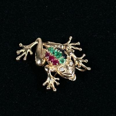EMERALD SAPPHIRE & 14K GOLD FROG PIN | Designed as a 14K gold frog-form pin/brooch set with diamond eyes, emeralds, and blue & pink...