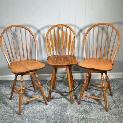 (3PC) CARVED WOOD BARSTOOLS | Pair of curved back wooden barstools with spindle back and turned wood legs and 1 curved back barstool with...