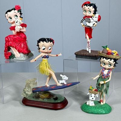 (4PC) MIXED BETTY BOOP FIGURINES | Including: “Surfs Up Betty Bobble” figurine, “Ooh-La-La” figurine, “Hawaiian Holiday” figurine, and...