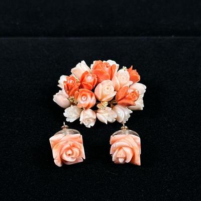 14K GOLD & CORAL JEWELRY | Including: carved coral cluster of flowers with 14K leaves and stems and matching pair of carved coral...