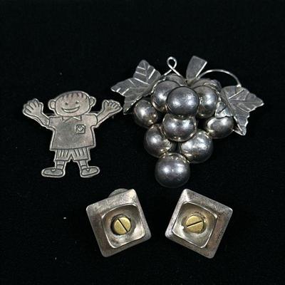 (4PC) STERLING SILVER JEWELRY | Includes: Bunch of grapes brooch marked “950” on back 33.9g, “Save the Children” child brooch stamped on...