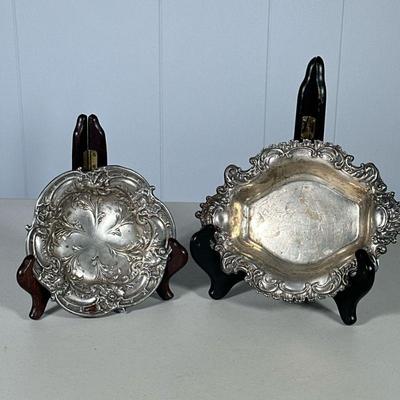 REED & BARTON STERLING SILVER BOWLS | Including: Circular bowl with floral pressing; 3.3 ozt. and oval dish with decorated rim; 4.3...