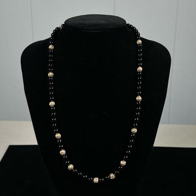 14K GOLD & BEAD NECKLACE | Gold and black beaded necklace, marked "14K" . - l. 20 in


