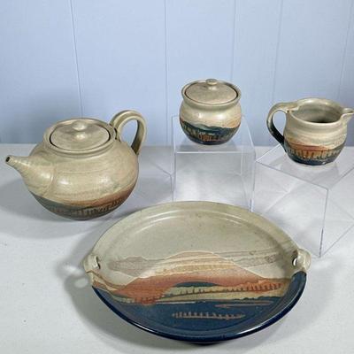 GLAZED CERAMIC TEA SET | Including: teapot, creamer, sugar bowl, and circular tray all decorated with colorful glazed landscape. - h. 6 x...