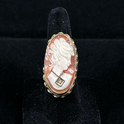 14K GOLD CAMEO RING | Designed as a (tested to) 14K gold & seashell carved cameo ring 1.25 in. Total weight: 6.7g. Ring size: 5 No...
