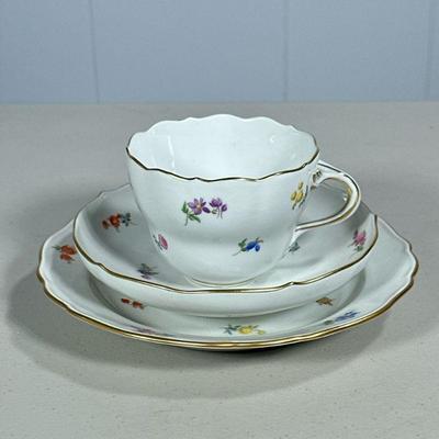 ANTIQUE MEISSEN TEACUP | Having floral design with gilt rim, includes teacup, saucer, and dessert plate. - dia. 7 in


