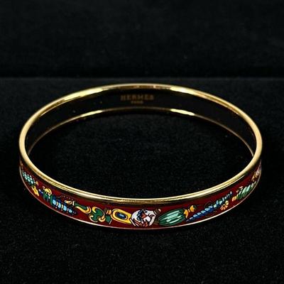 HERMES ENAMEL BANGLE BRACELET | Narrow perfume bottle enamel bangle bracelet by Hermes. - dia. 2.75 in

