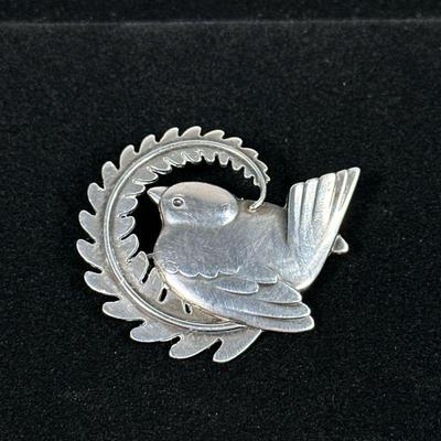 GEORG JENSEN STERLING DOVE BROOCH | Designed as a sterling silver dove-form brooch/pin, marked on back “Georg Jensen / STERLING / DENMARK...